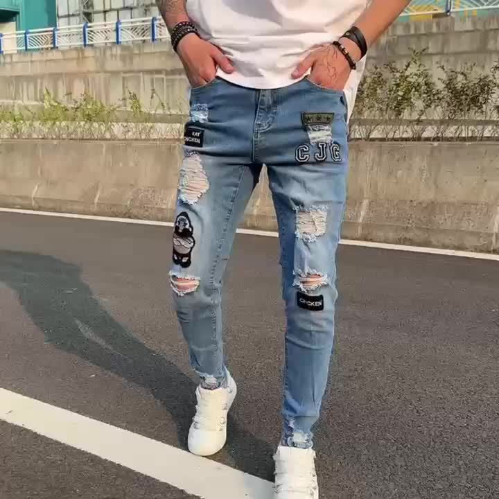 Men's Hip-Hop Style Slim Fit Stretch Denim Jeans with Distressed Details, Ripped Badge Accents - Mid-Rise, Raw Hem, Machine Washable, Grey